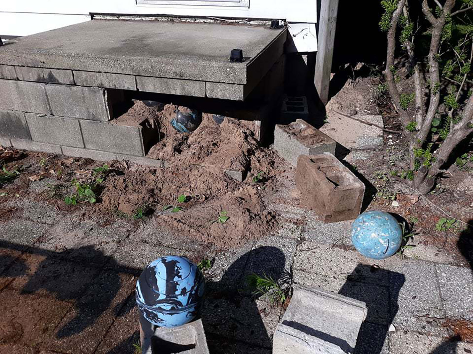 Home renovation leads to discovery of over 150 bowling balls under Michigan family's porch